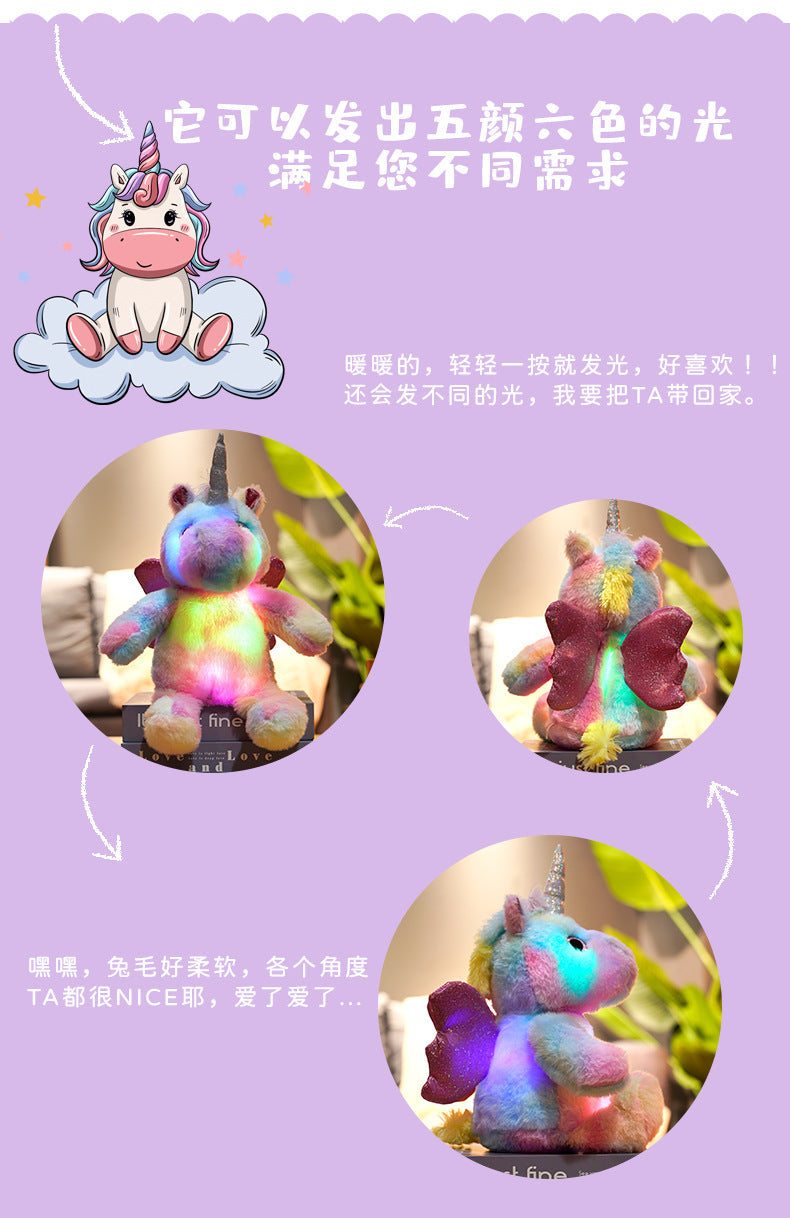 Glowing Unicorn Plush Toy on bed