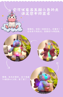 Glowing Unicorn Plush Toy on bed
