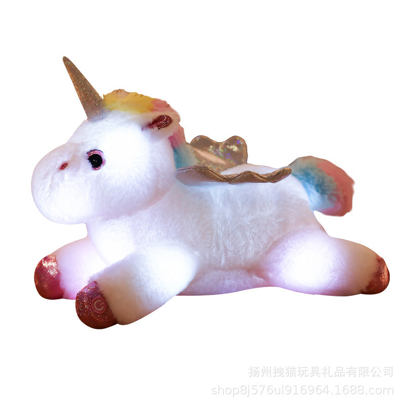 Glowing Unicorn Plush Toy glowing at night