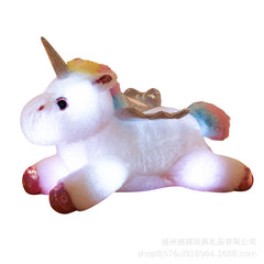 Glowing Unicorn Plush Toy glowing at night