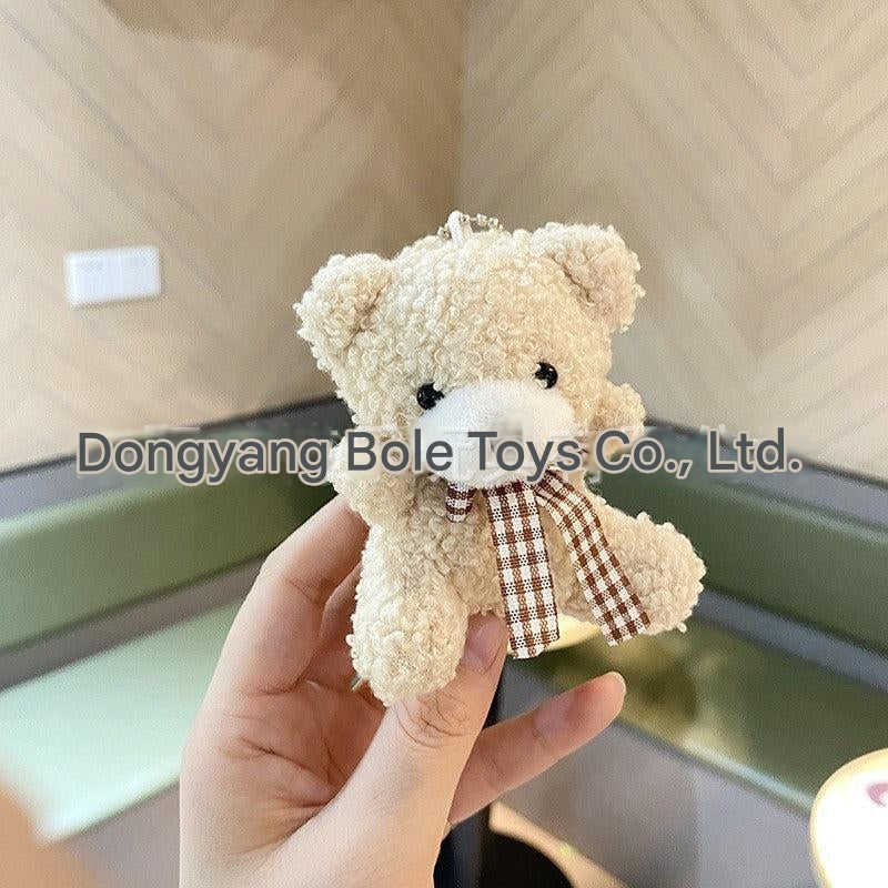 Lightweight plush keychain on backpack