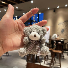 Teddy bear and bunny soft toy charm image