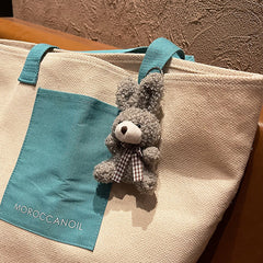 Teddy bear and bunny soft toy charm image