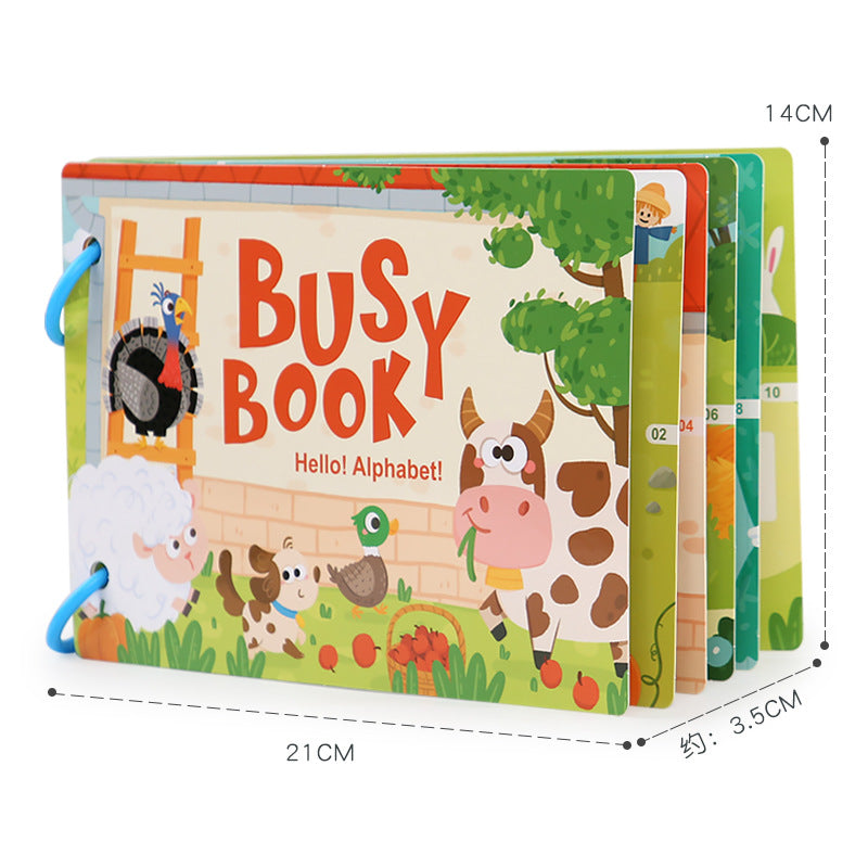 Toddler engaging with quiet book kit