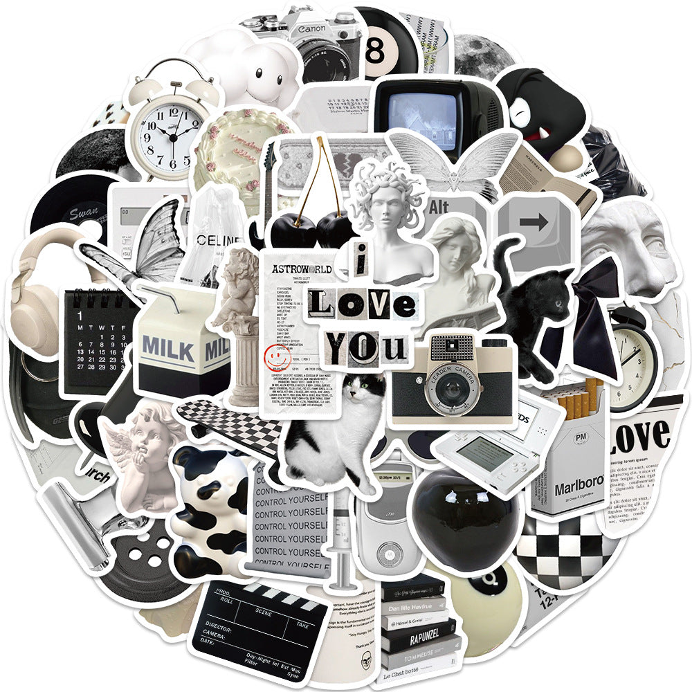 Assorted monochrome graffiti stickers displayed