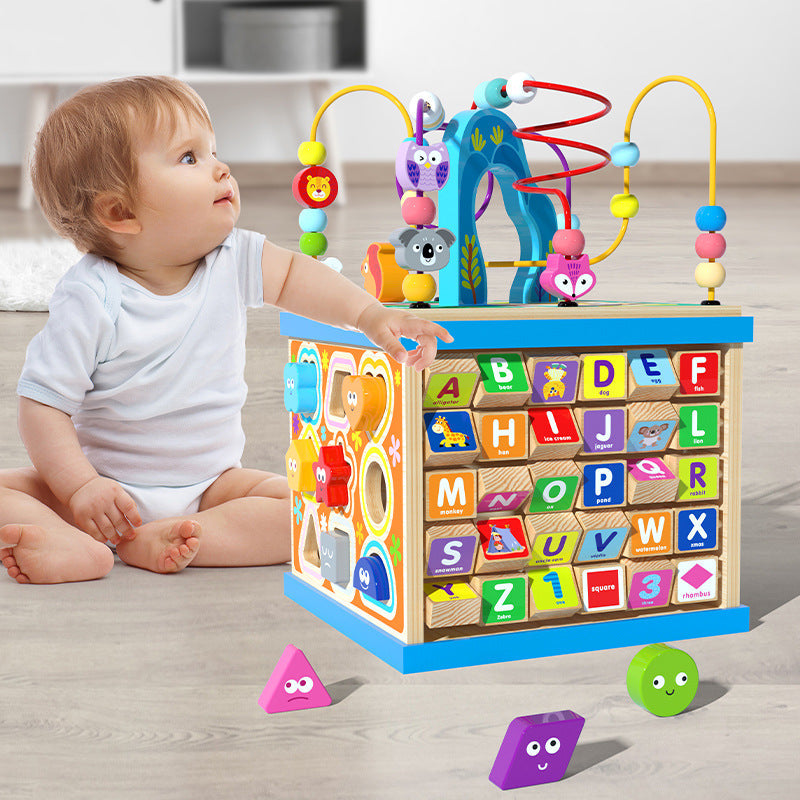 Children playing with educational toy box