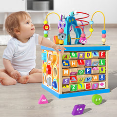 Children playing with educational toy box