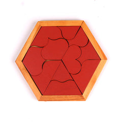 Engaged child solving a hexagon puzzle