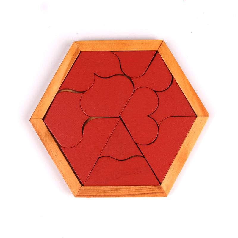 Engaged child solving a hexagon puzzle