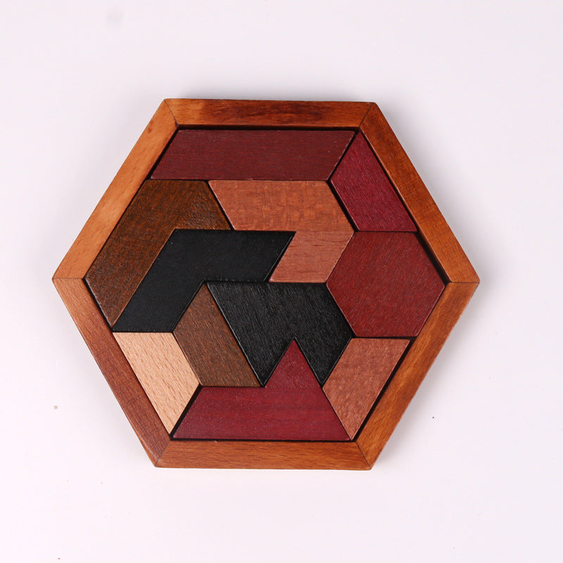 Toddler manipulating wooden puzzle pieces