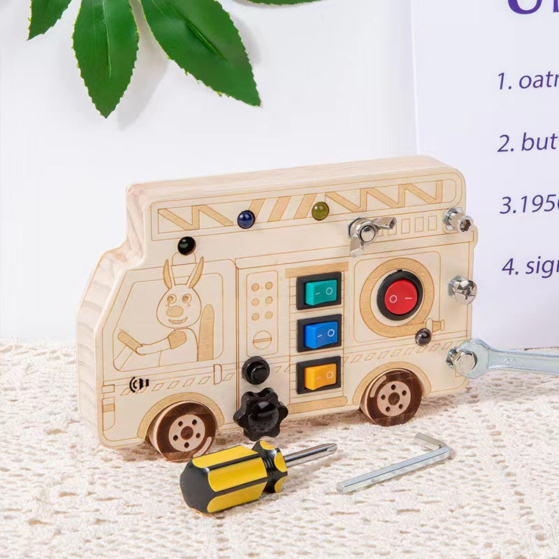 Dimensions of the Busy Board next to a toy