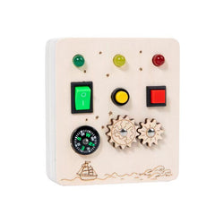 Toys surrounding the Interactive Busy Board