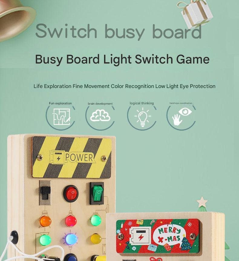 Child's hands on the Busy Board's features