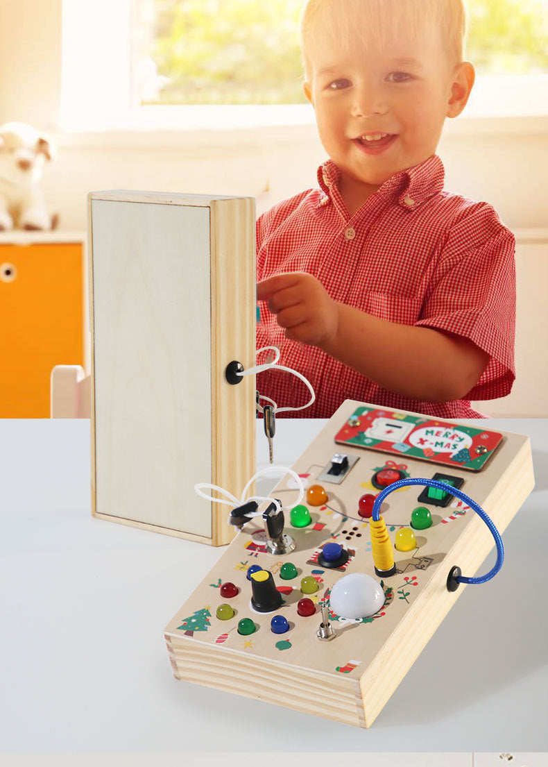 Dimensions of the Busy Board next to a toy