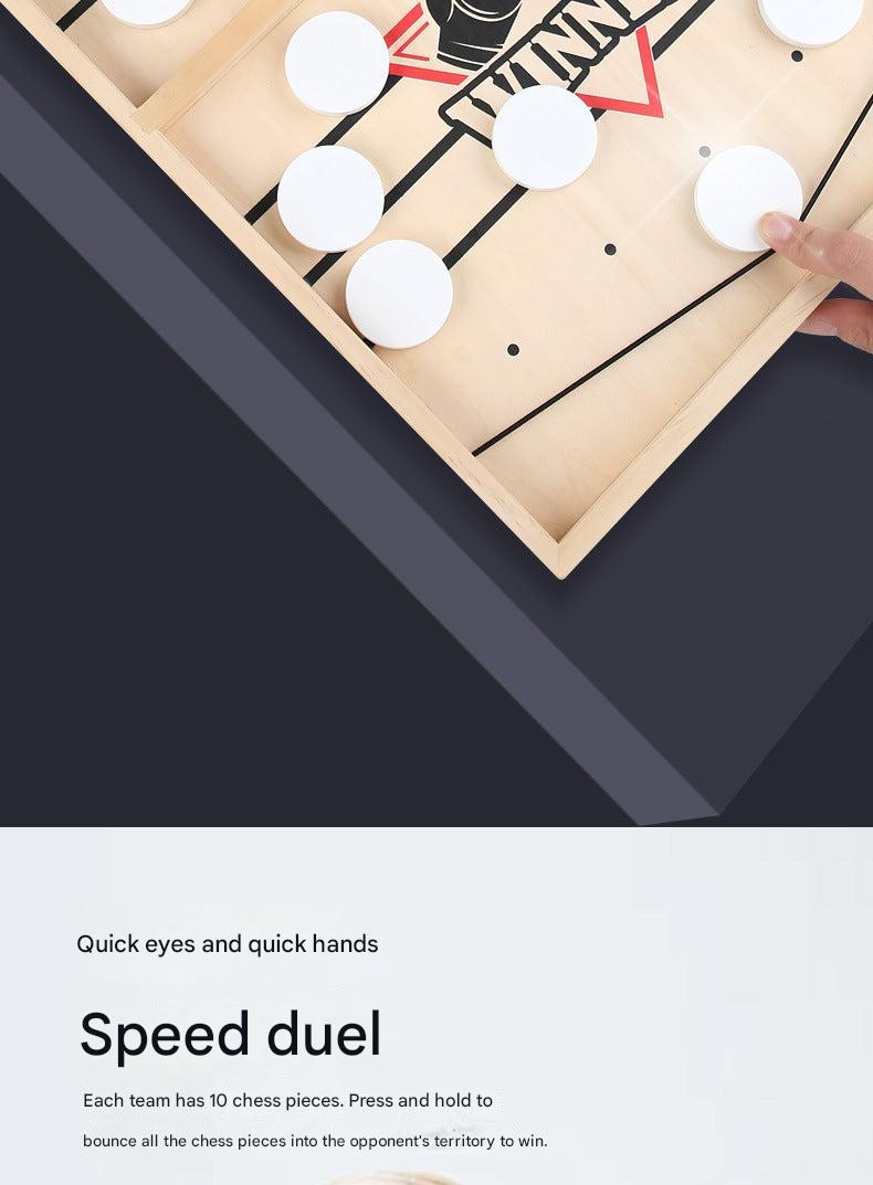 Players engaging in catapult chess game