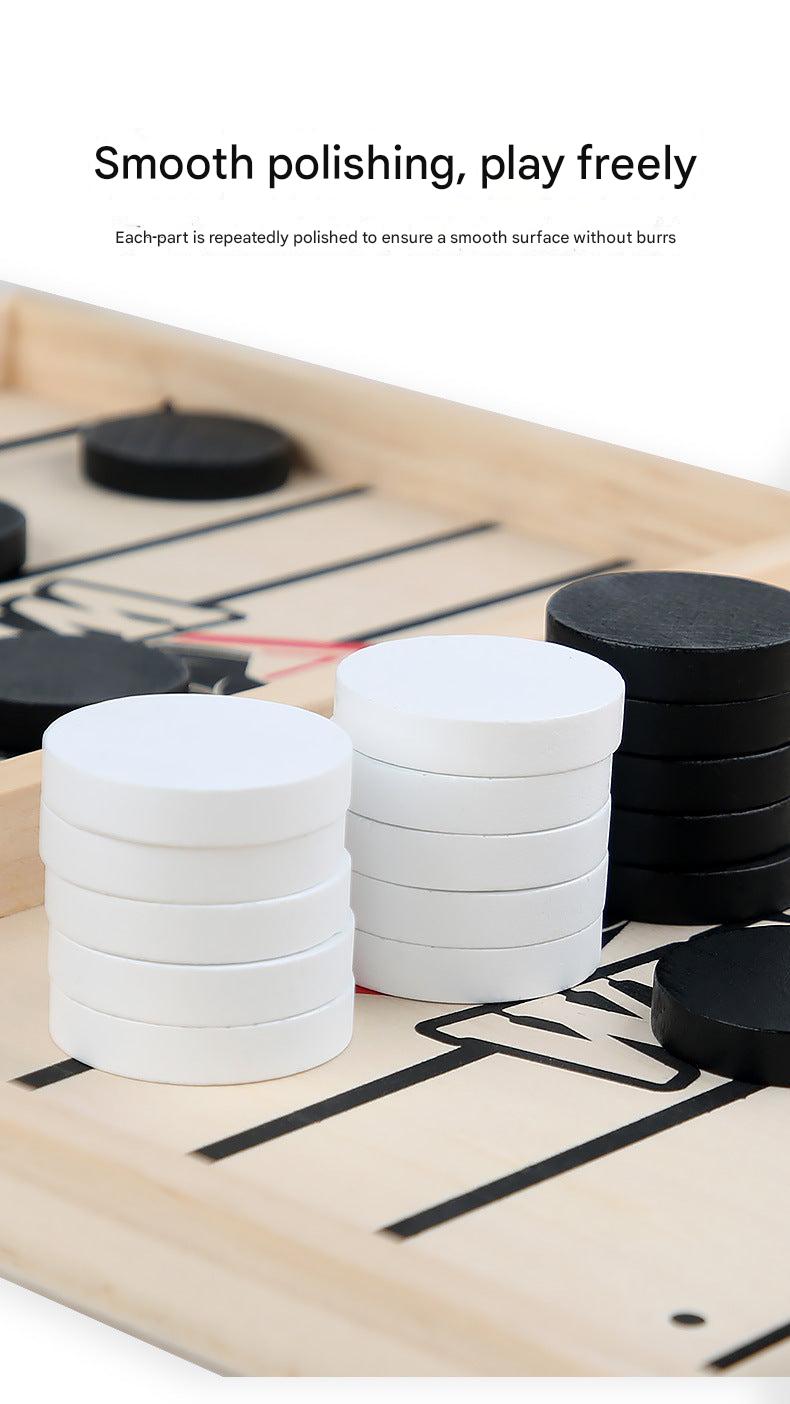 Players engaging in catapult chess game