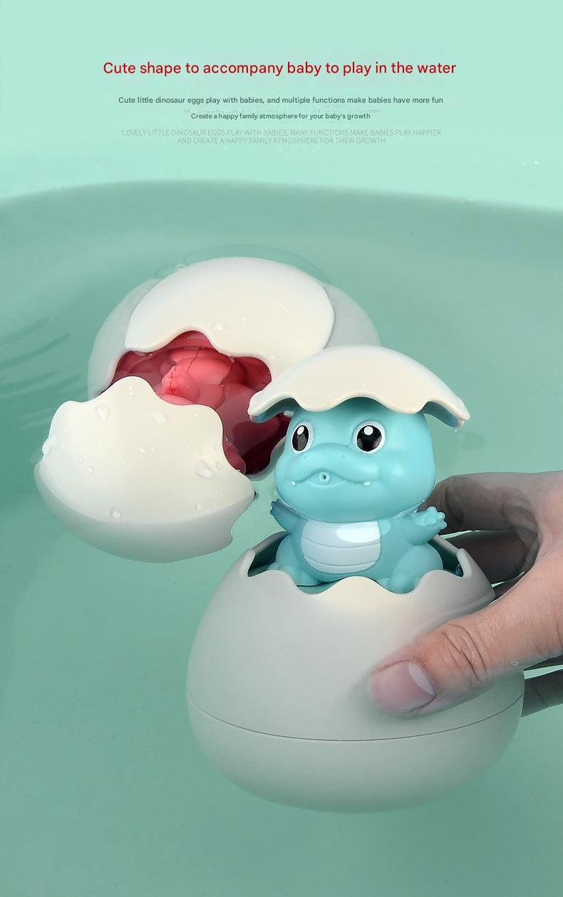 Toddler enjoying bath time with toys