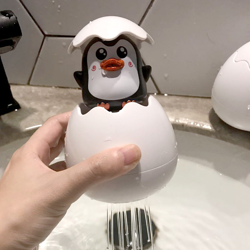 Kids playing with Duckling and Penguin Egg Bath Toys