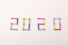 Children playing with magnetic building sticks image 9