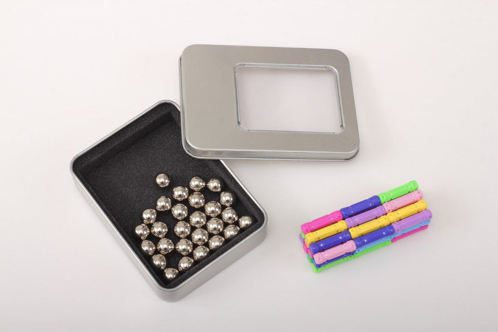 Different colours of magnetic building sticks and balls image 10