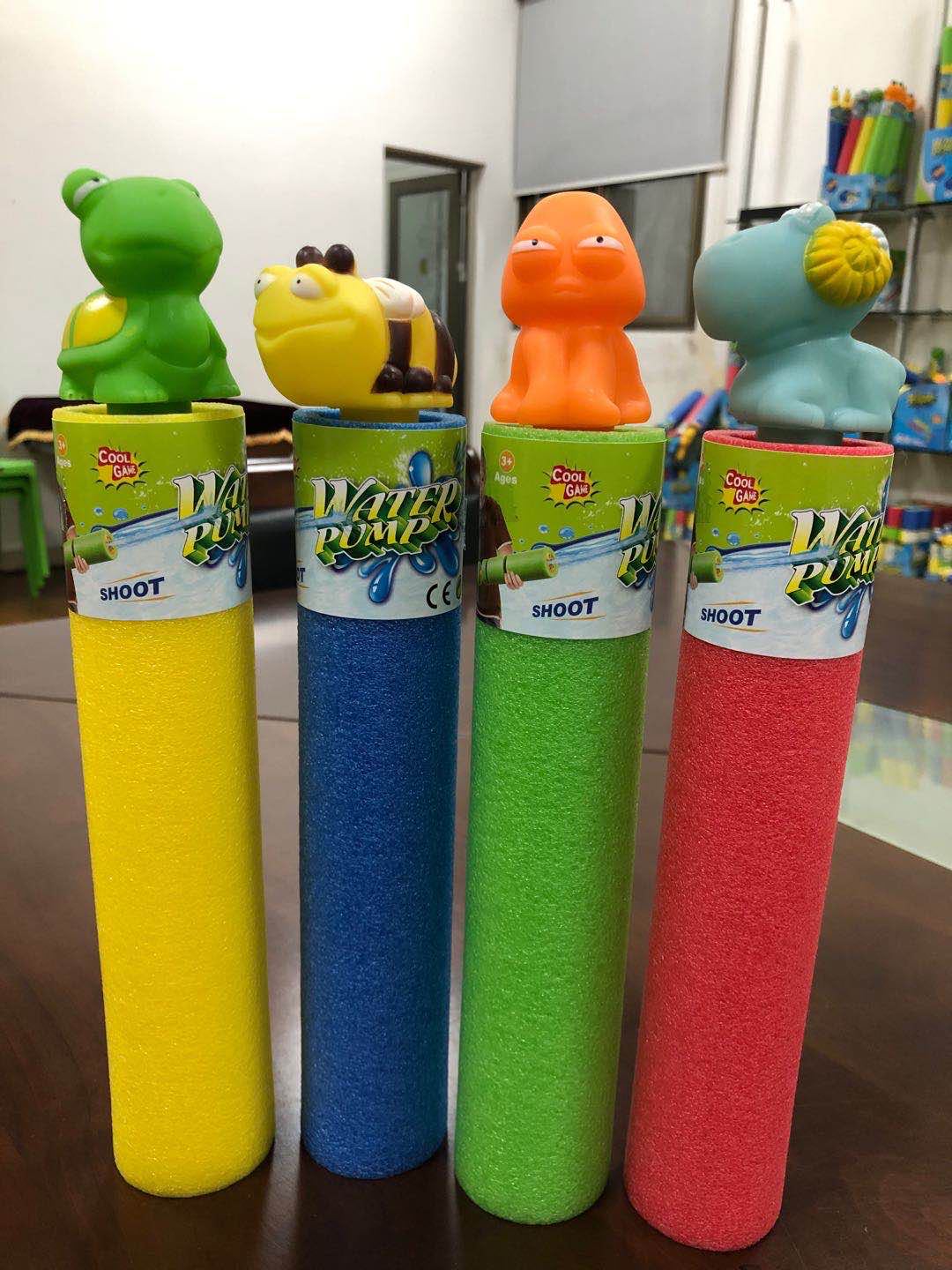 Kids enjoying summer play activities with water guns 9
