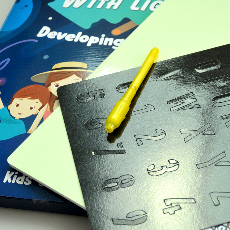 Kids enjoying creative play with drawing board