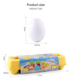 Child assembling colourful educational eggs 9