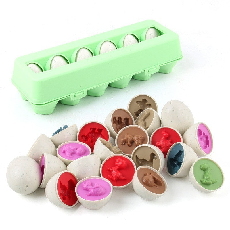 Child assembling colourful educational eggs 9