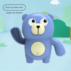 Toddler enjoying bath time with animal toy