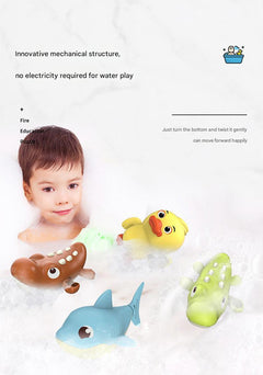 Toddler playing with a colourful swimming toy