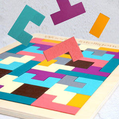 Toddler playing with Wooden Tetris Puzzle Blocks