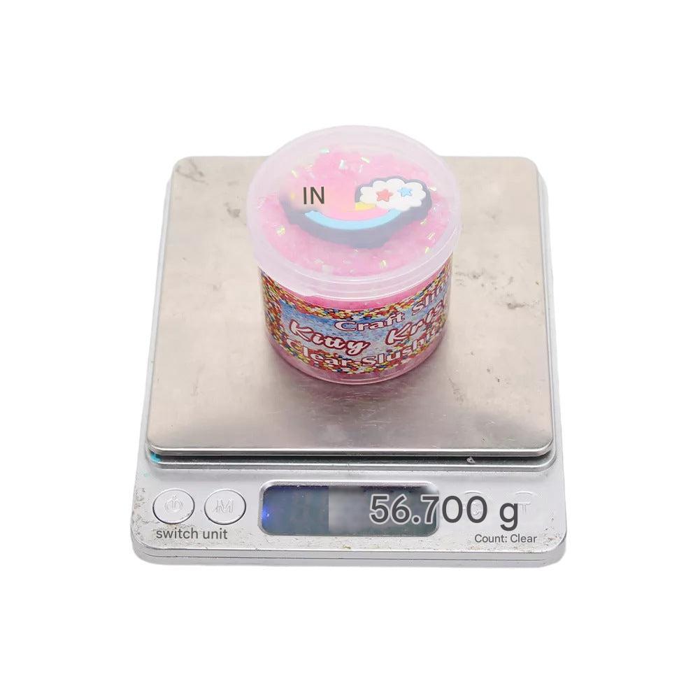 Multicoloured slime being shaped with tools