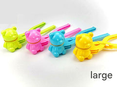 Cartoon Dinosaur Snowball Maker in action