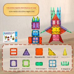 Hands-on play with multicoloured building tiles image 10