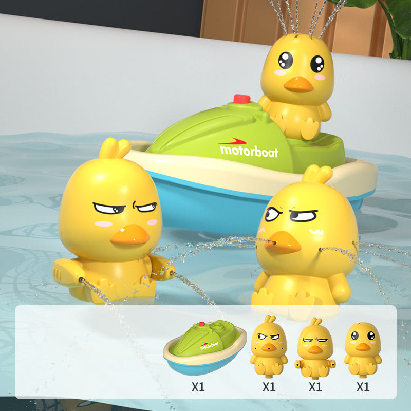 Child Playing with Yellow Duck Bath Toy Image 3