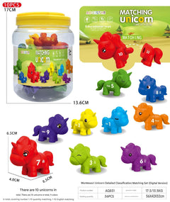 Child playing with dinosaur letter and number toy