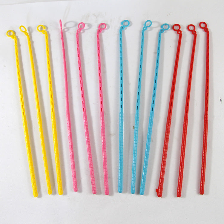 Children engaging with twist bars craft