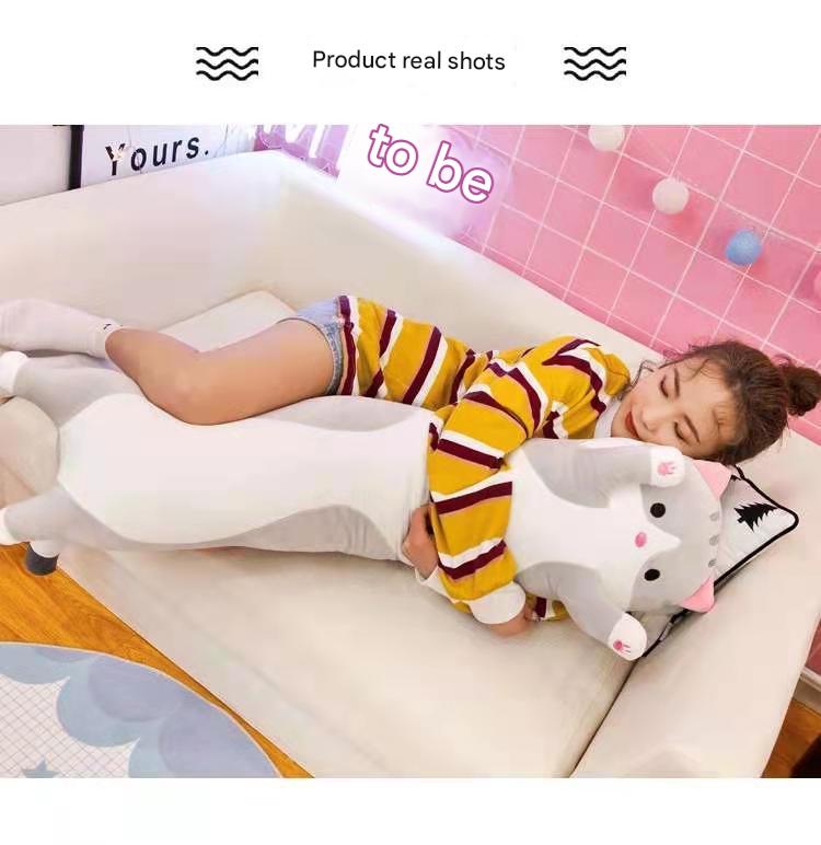 Large cuddly cat plush pillow side view