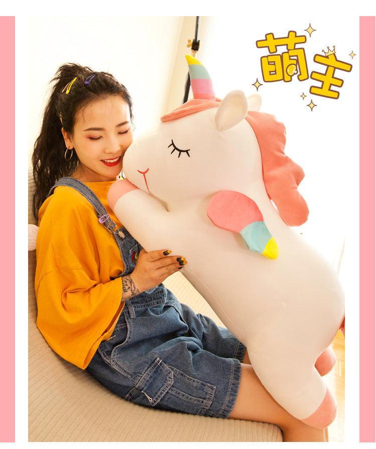 Angel Unicorn Plush Toy with kids playing around
