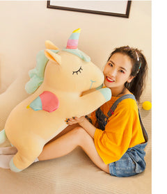 Angel Unicorn Plush Toy on a children's bed