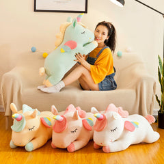 Angel Unicorn Plush Toy against a pastel background