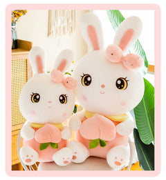 Soft Peach Bunny Plush Toy on a bed