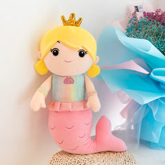 Mom and daughter with the mermaid plush doll