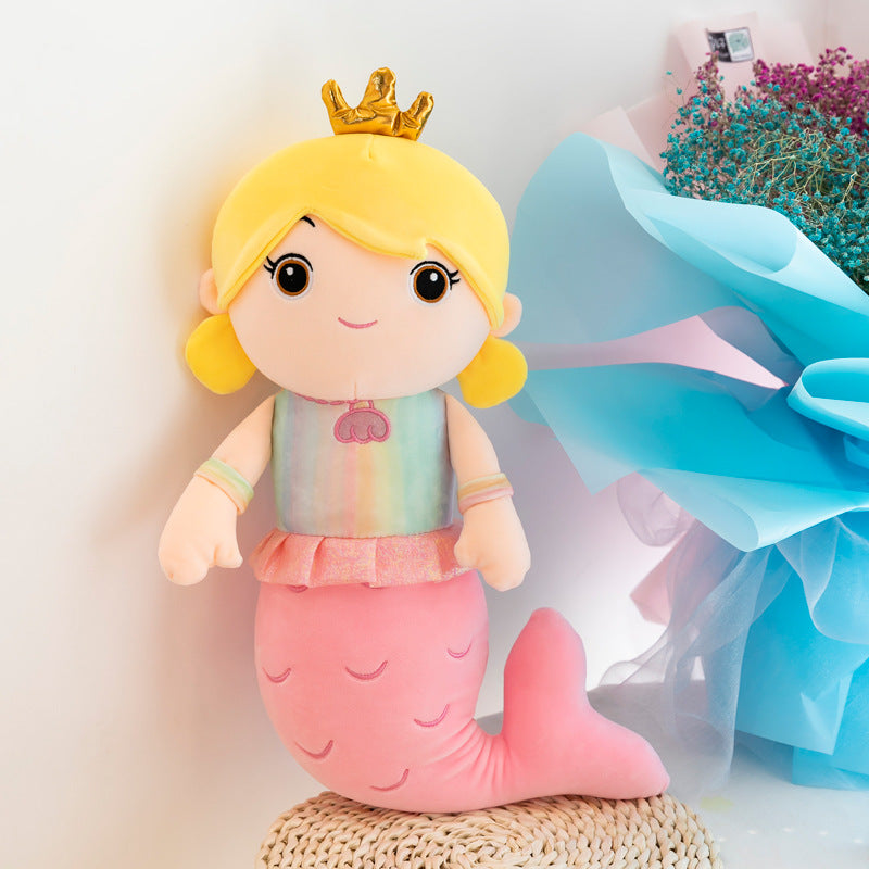 Mom and daughter with the mermaid plush doll