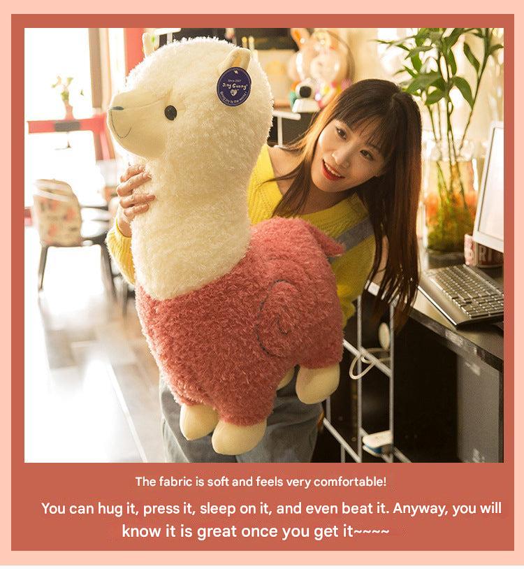 Image of cute alpaca plush toy front view