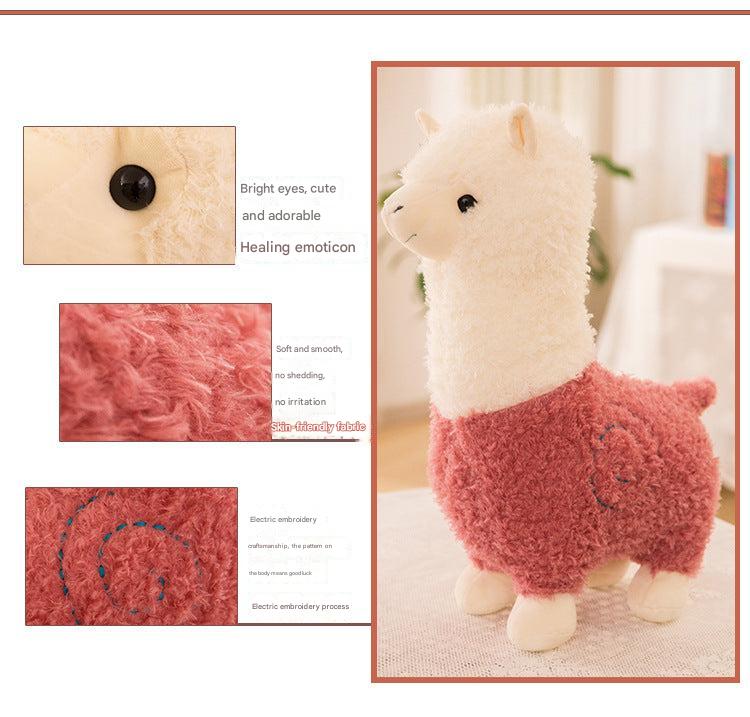 Side view of soft stuffed llama doll