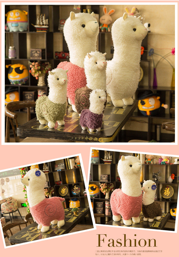 Alpaca plush toy with a smile