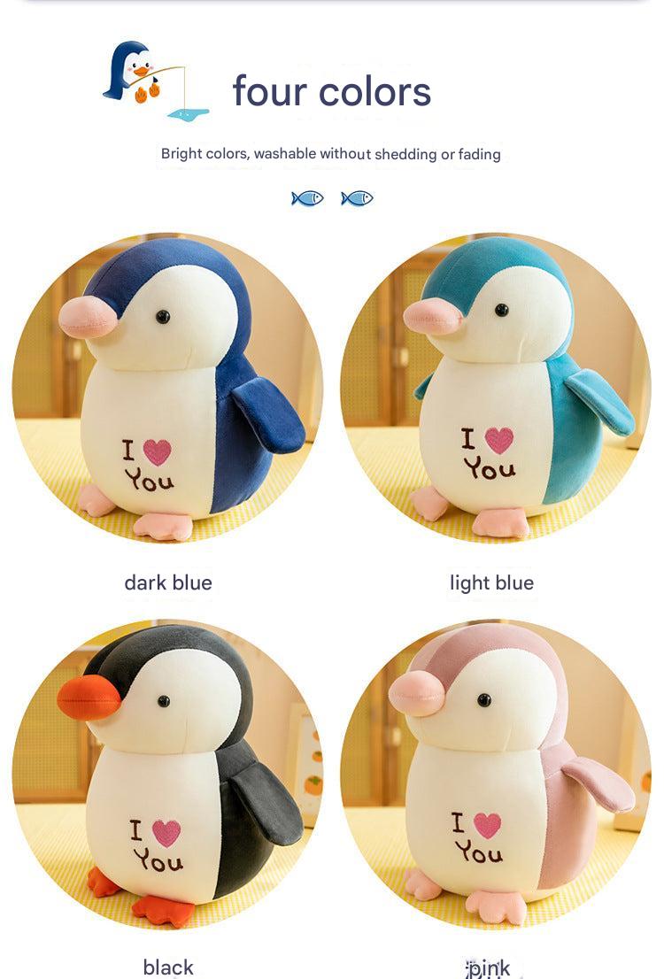 Cuddly Penguin Plush on a soft surface image 6