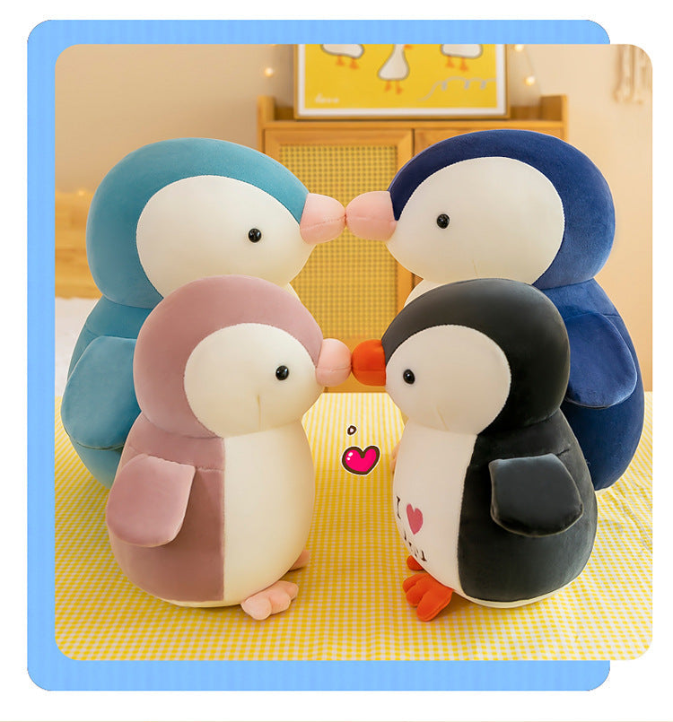 Cuddly Penguin Plush Toy on display image 9
