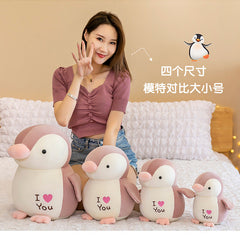 Cuddly Penguin with kids playing image 10